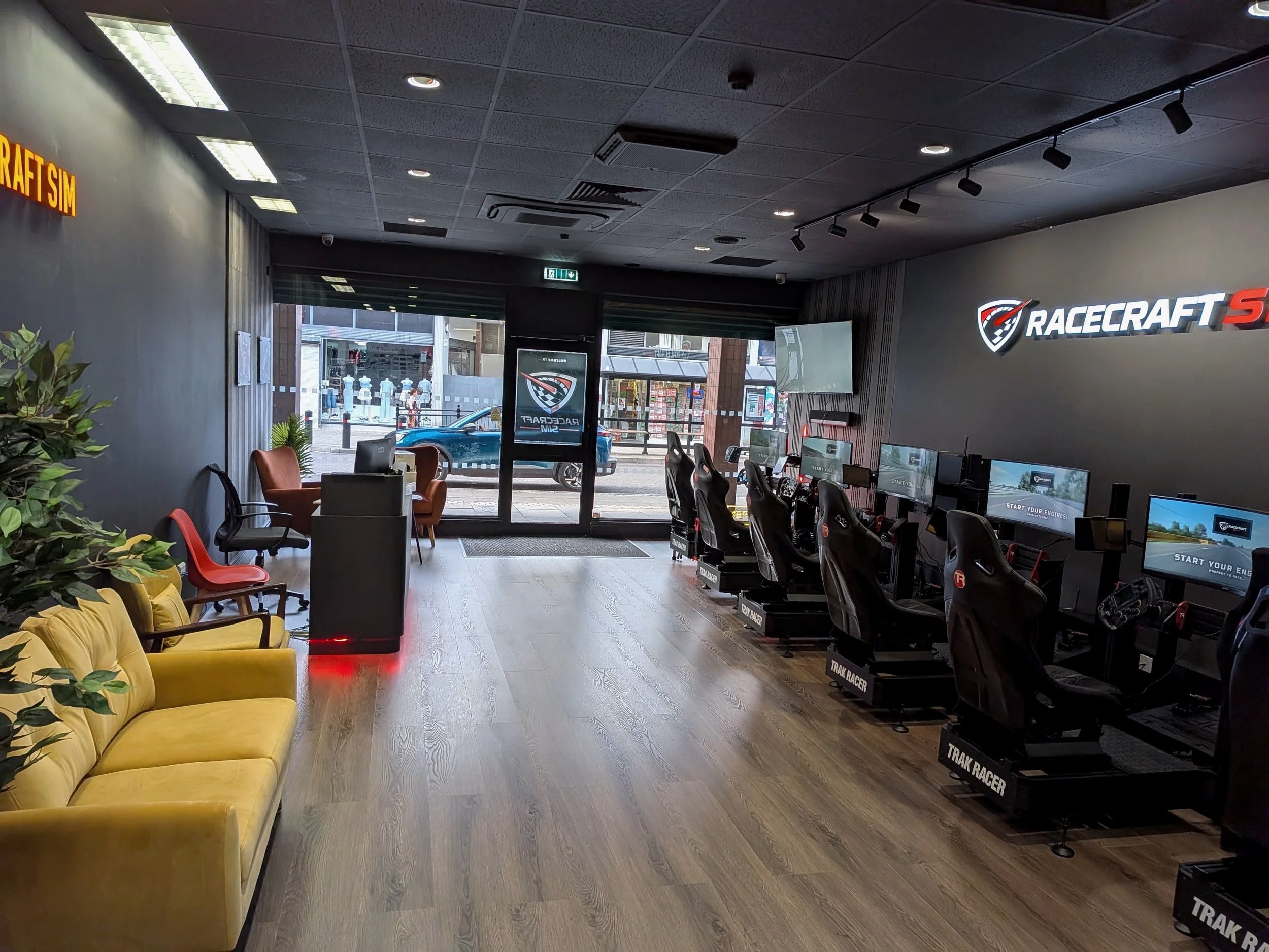 The Racecraft Sim venue floor with rows of rigs